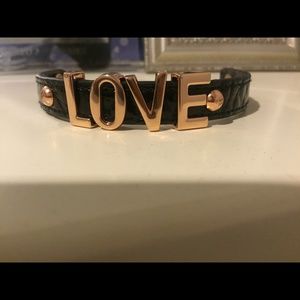 Black Love BCBG bracelet. never worn!!!!