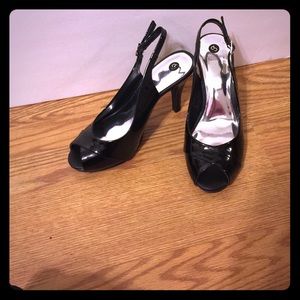 Black peep toe shoes. Size 7.5