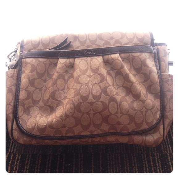 Coach messenger bag, with an extra pad.