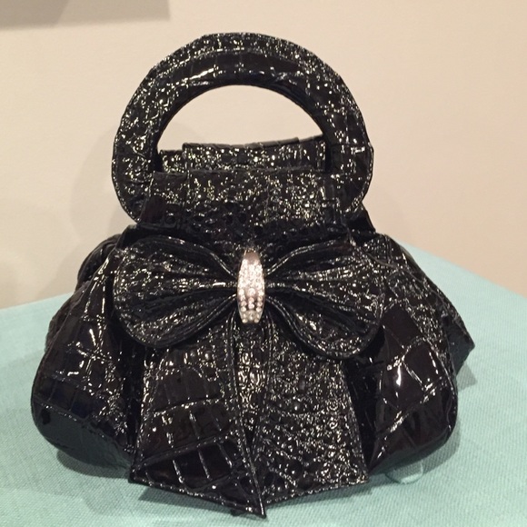 Black alligator skin patent leather clutch