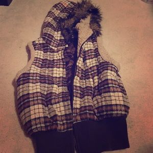 Brown vest , broken zipper