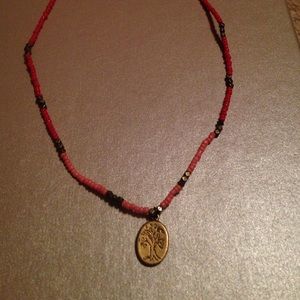 Tree pendant necklace.