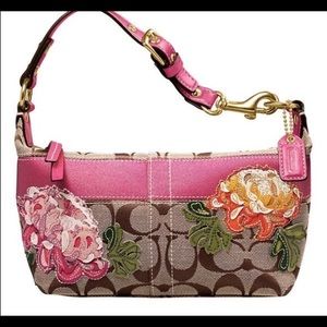 Coach small tan purse with flower decal
