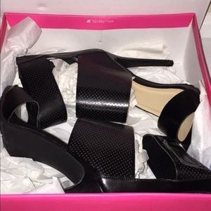 Black leather high heel sandals