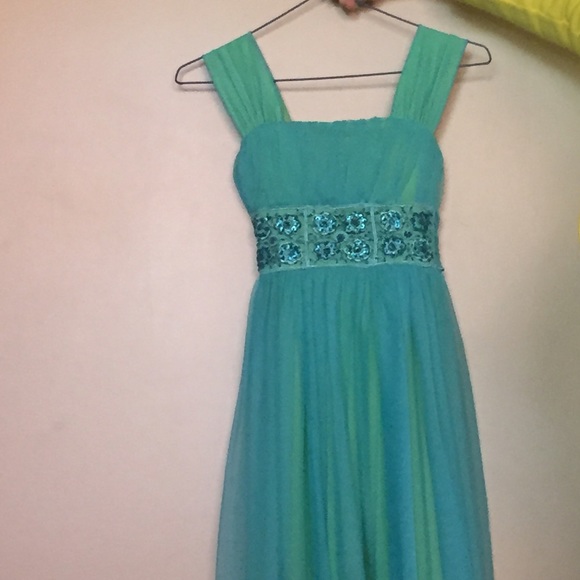 Blue green fancy prom dress with bedazzles