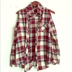 Plaid top with sleeve cutouts