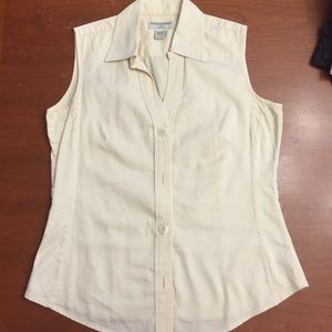 Cream button down sleeveless shirt