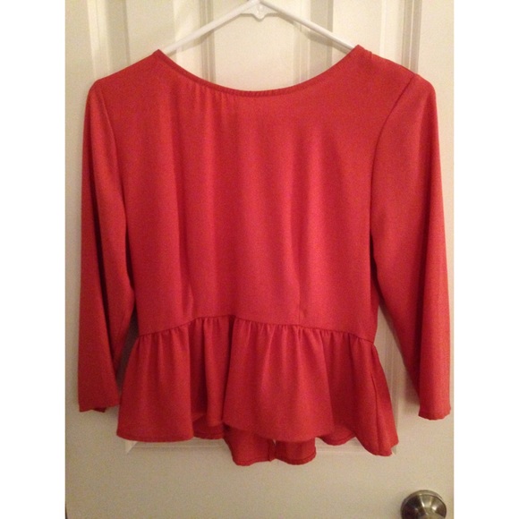 Orange peplum top