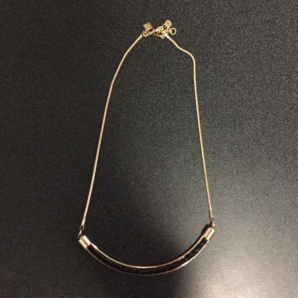 Gold and leather necklace