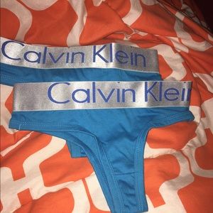 Two blue Calvin Klein undies