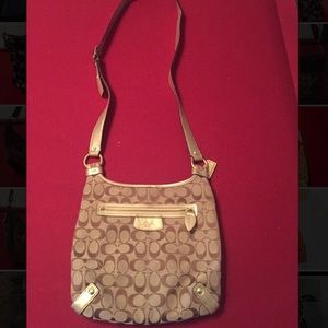 Cross body Coach Purse.