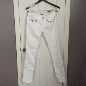 White studded skinny jeans
