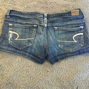 Worn out American Eagle shorts