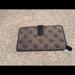Dooney and Bourke checkbook wallet.