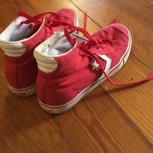Red converse high tops