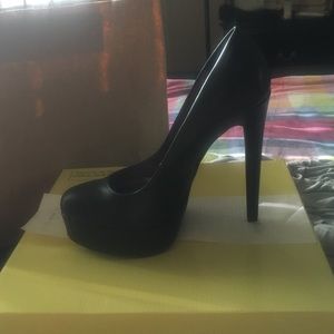 Never been worn, black size 7.