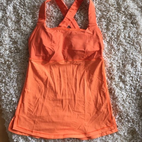 Lululemon top. Bright orange, size 4