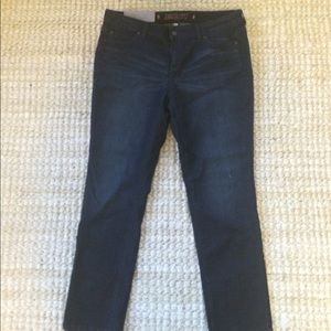 Jennifer Lopez dark wash jeans