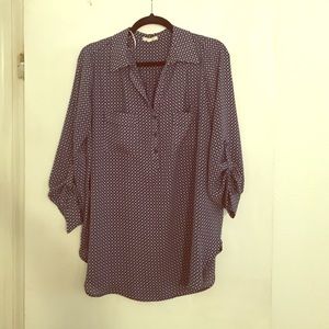 Blue tunic with small white detailing. Size XL