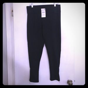 New with tags leggings with zipper detail. Size XL