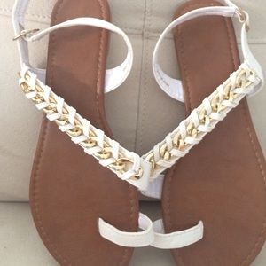 White sandals with braided gold chain