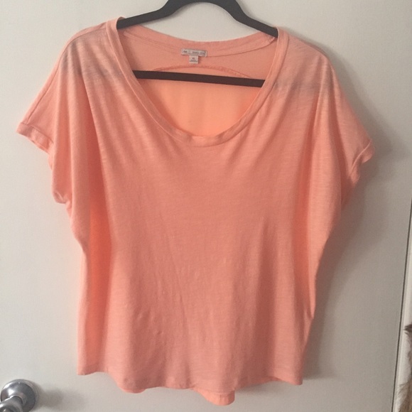 salmon colored shirt