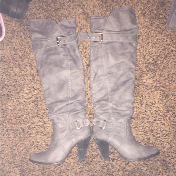 Grey boots from the buckle