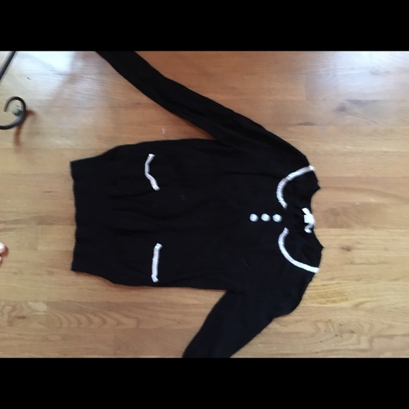 cute black sweater with brad details!