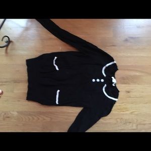 cute black sweater with brad details!