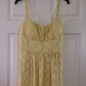 Woman's yellow spaghetti strap dress warn once