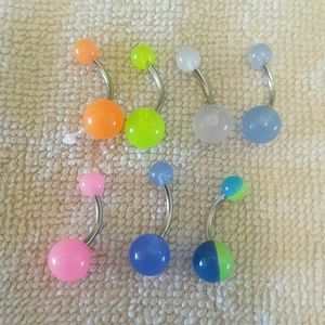 Lot of 7 glow in the dark belly rings