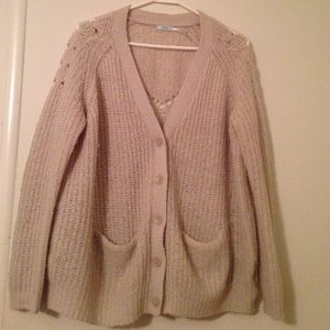 White knitted cardigan. UrbanOutfitters