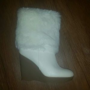 Jennifer Lopez white wedge winter boots