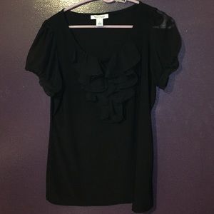 Black blouse with ruffle details on neck