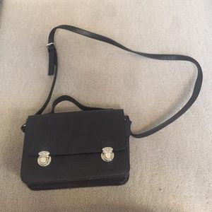 black buckle bag