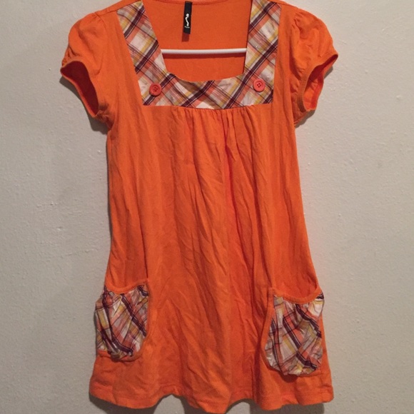 Orange cap sleeve shirt