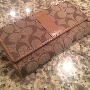 Coach wallet- pen damage