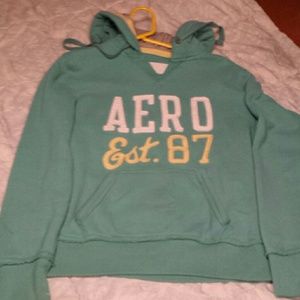 Teal with yellow n white writing aero hoodie