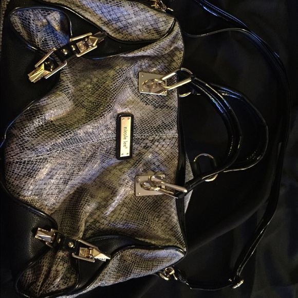 Nicole Lee snake skin bag