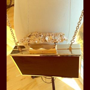 BCBG Black and Gold Knuckle handle Clutch