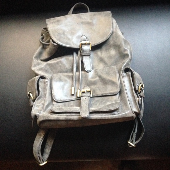 Vegan leather gray rucksack with lots of pockets