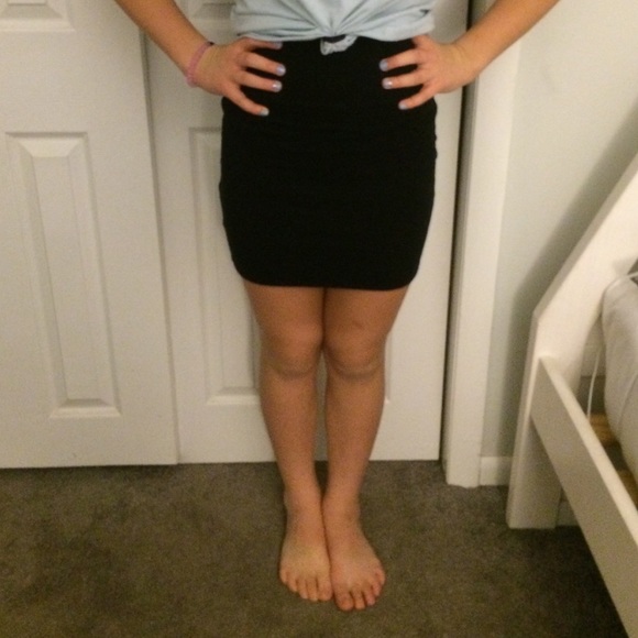 Black fitted mini skirt