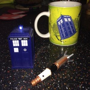 Doctor who tardis, mug, and sonic screwdriver.