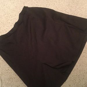 Black skort with side zipper.  SOLD