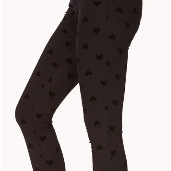 Forever 21 Black skinny stretch jeans w/ hearts