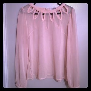 Chic sheer blouse with beautiful geometric cutouts