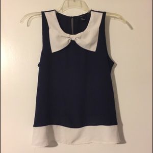 Navy blue blouse with white bow