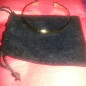Gold plated bangle comes with pouch