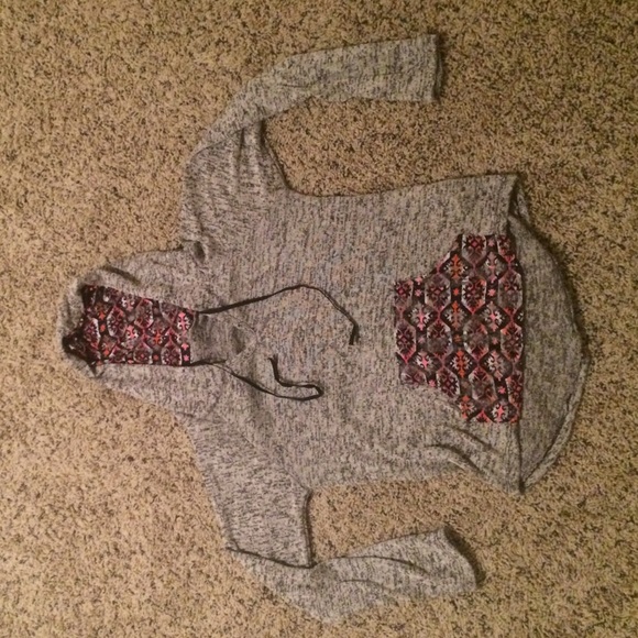 gray hoodie with tribal print pattern