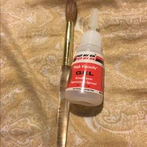 Used brush and nail glue